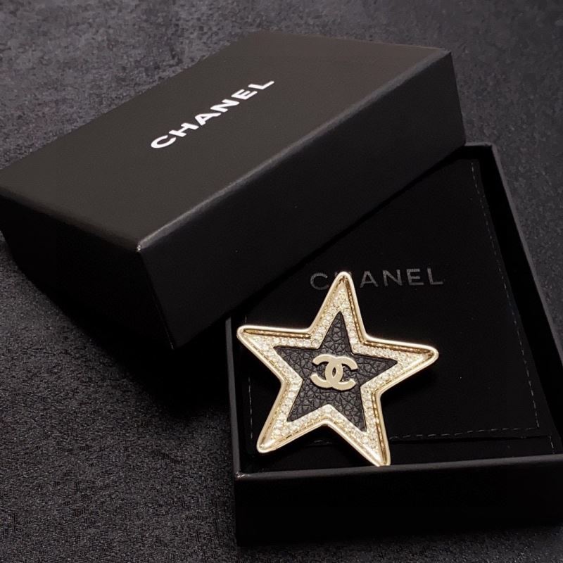 Ch**el brooches